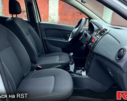 Белый Рено Логан, объемом двигателя 1.5 л и пробегом 63 тыс. км за 9800 $, фото 5 на Automoto.ua