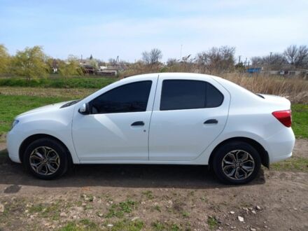 Білий Рено Логан, об'ємом двигуна 1.5 л та пробігом 87 тис. км за 8599 $, фото 1 на Automoto.ua