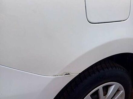 Білий Рено Логан, об'ємом двигуна 1 л та пробігом 111 тис. км за 5000 $, фото 1 на Automoto.ua