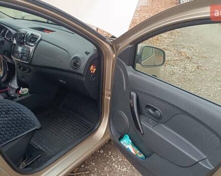 Бежевий Рено Логан, об'ємом двигуна 1.46 л та пробігом 72 тис. км за 12000 $, фото 5 на Automoto.ua