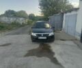 Черный Рено Логан, объемом двигателя 1.4 л и пробегом 220 тыс. км за 2600 $, фото 1 на Automoto.ua
