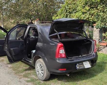 Черный Рено Логан, объемом двигателя 1.4 л и пробегом 154 тыс. км за 4600 $, фото 3 на Automoto.ua