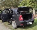 Черный Рено Логан, объемом двигателя 1.4 л и пробегом 154 тыс. км за 4600 $, фото 3 на Automoto.ua