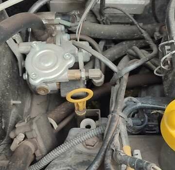 Черный Рено Логан, объемом двигателя 1.4 л и пробегом 154 тыс. км за 4600 $, фото 1 на Automoto.ua