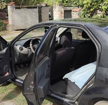 Черный Рено Логан, объемом двигателя 1.4 л и пробегом 154 тыс. км за 4600 $, фото 4 на Automoto.ua