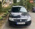 Черный Рено Логан, объемом двигателя 1.4 л и пробегом 145 тыс. км за 5600 $, фото 1 на Automoto.ua