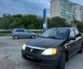 Черный Рено Логан, объемом двигателя 1.4 л и пробегом 234 тыс. км за 3800 $, фото 1 на Automoto.ua