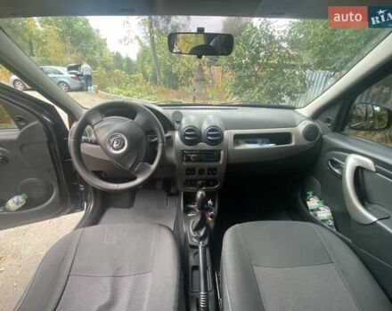 Черный Рено Логан, объемом двигателя 1.4 л и пробегом 145 тыс. км за 5600 $, фото 9 на Automoto.ua