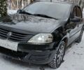 Черный Рено Логан, объемом двигателя 1.39 л и пробегом 240 тыс. км за 6000 $, фото 1 на Automoto.ua