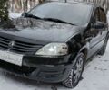 Черный Рено Логан, объемом двигателя 1.39 л и пробегом 240 тыс. км за 6000 $, фото 1 на Automoto.ua
