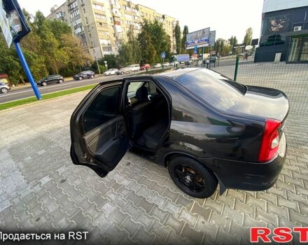 Черный Рено Логан, объемом двигателя 1.6 л и пробегом 235 тыс. км за 3500 $, фото 3 на Automoto.ua