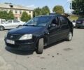 Черный Рено Логан, объемом двигателя 1.39 л и пробегом 200 тыс. км за 2499 $, фото 1 на Automoto.ua