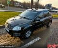 Черный Рено Логан, объемом двигателя 1.4 л и пробегом 138 тыс. км за 5499 $, фото 1 на Automoto.ua
