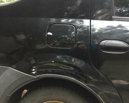 Черный Рено Логан, объемом двигателя 1.39 л и пробегом 224 тыс. км за 2600 $, фото 8 на Automoto.ua