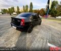 Черный Рено Логан, объемом двигателя 1.6 л и пробегом 235 тыс. км за 3500 $, фото 5 на Automoto.ua