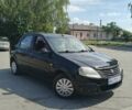 Черный Рено Логан, объемом двигателя 1.39 л и пробегом 200 тыс. км за 2499 $, фото 3 на Automoto.ua