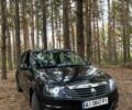 Черный Рено Логан, объемом двигателя 1.6 л и пробегом 74 тыс. км за 4700 $, фото 1 на Automoto.ua