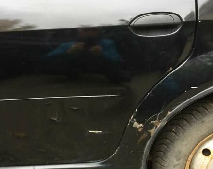 Черный Рено Логан, объемом двигателя 1.39 л и пробегом 224 тыс. км за 2600 $, фото 6 на Automoto.ua