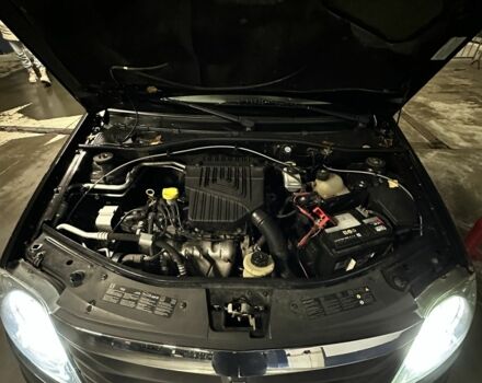 Черный Рено Логан, объемом двигателя 1.4 л и пробегом 149 тыс. км за 5200 $, фото 7 на Automoto.ua