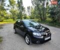Черный Рено Логан, объемом двигателя 1.46 л и пробегом 213 тыс. км за 5700 $, фото 1 на Automoto.ua