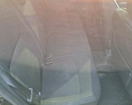 Черный Рено Логан, объемом двигателя 0.9 л и пробегом 52 тыс. км за 12500 $, фото 2 на Automoto.ua