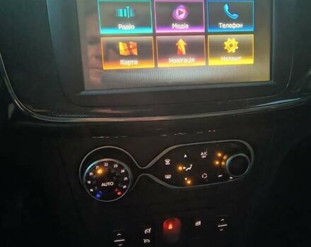 Черный Рено Логан, объемом двигателя 0.9 л и пробегом 52 тыс. км за 12500 $, фото 1 на Automoto.ua