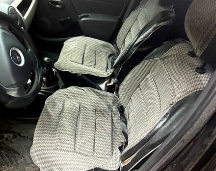 Черный Рено Логан, объемом двигателя 1.4 л и пробегом 220 тыс. км за 2100 $, фото 1 на Automoto.ua