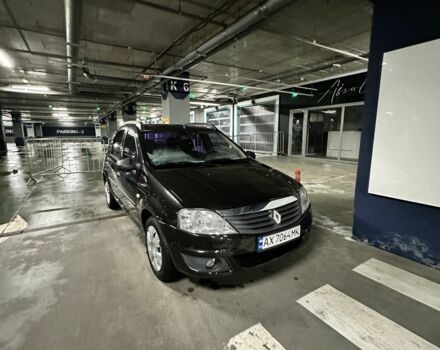 Черный Рено Логан, объемом двигателя 1.4 л и пробегом 149 тыс. км за 5200 $, фото 1 на Automoto.ua