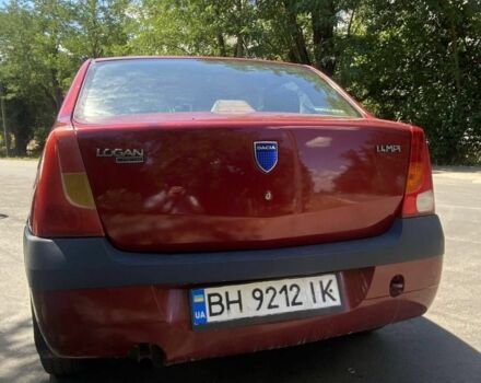 Красный Рено Логан, объемом двигателя 1.4 л и пробегом 300 тыс. км за 3000 $, фото 2 на Automoto.ua