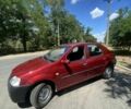 Красный Рено Логан, объемом двигателя 1.4 л и пробегом 300 тыс. км за 3000 $, фото 3 на Automoto.ua