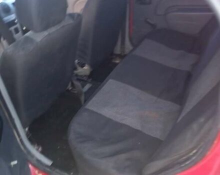 Красный Рено Логан, объемом двигателя 1.4 л и пробегом 246 тыс. км за 2450 $, фото 1 на Automoto.ua