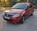 Красный Рено Логан, объемом двигателя 1.4 л и пробегом 152 тыс. км за 4499 $, фото 1 на Automoto.ua