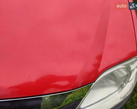 Красный Рено Логан, объемом двигателя 1.39 л и пробегом 177 тыс. км за 4100 $, фото 7 на Automoto.ua