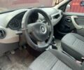 Красный Рено Логан, объемом двигателя 1.4 л и пробегом 295 тыс. км за 3500 $, фото 2 на Automoto.ua