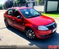 Красный Рено Логан, объемом двигателя 1.4 л и пробегом 189 тыс. км за 3850 $, фото 1 на Automoto.ua