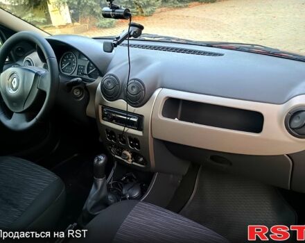 Красный Рено Логан, объемом двигателя 1.4 л и пробегом 130 тыс. км за 6450 $, фото 8 на Automoto.ua