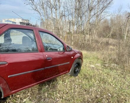 Красный Рено Логан, объемом двигателя 1.4 л и пробегом 179 тыс. км за 1850 $, фото 4 на Automoto.ua