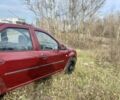 Красный Рено Логан, объемом двигателя 1.4 л и пробегом 179 тыс. км за 1850 $, фото 4 на Automoto.ua