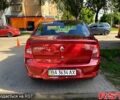 Красный Рено Логан, объемом двигателя 1.4 л и пробегом 205 тыс. км за 3900 $, фото 1 на Automoto.ua