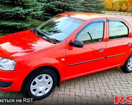 Красный Рено Логан, объемом двигателя 1.4 л и пробегом 130 тыс. км за 6450 $, фото 1 на Automoto.ua