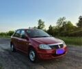 Красный Рено Логан, объемом двигателя 1.5 л и пробегом 176 тыс. км за 5700 $, фото 1 на Automoto.ua