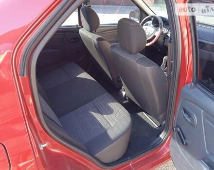 Красный Рено Логан, объемом двигателя 1.4 л и пробегом 120 тыс. км за 6000 $, фото 6 на Automoto.ua