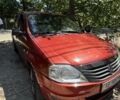 Червоний Рено Логан, об'ємом двигуна 1.4 л та пробігом 130 тис. км за 3594 $, фото 1 на Automoto.ua