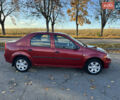 Рено Логан 2012 в Владимир-Волынский на Automoto.ua Красный Рено Логан, объемом двигателя 1.6 л и пробегом 192 тыс. км за 4200 $, фото 5 на Automoto.ua