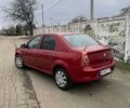 Красный Рено Логан, объемом двигателя 1.39 л и пробегом 236 тыс. км за 4500 $, фото 1 на Automoto.ua