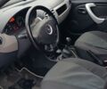 Красный Рено Логан, объемом двигателя 1.39 л и пробегом 104 тыс. км за 6300 $, фото 9 на Automoto.ua