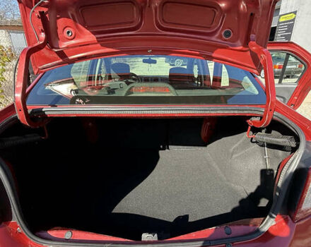 Червоний Рено Логан, об'ємом двигуна 1.15 л та пробігом 220 тис. км за 4200 $, фото 4 на Automoto.ua