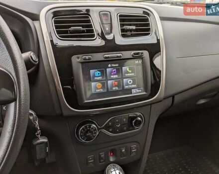 Червоний Рено Логан, об'ємом двигуна 1.6 л та пробігом 76 тис. км за 8500 $, фото 7 на Automoto.ua