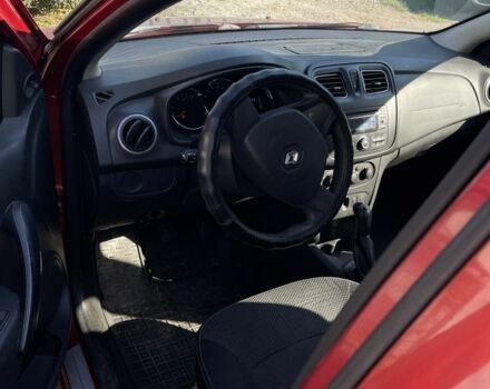 Красный Рено Логан, объемом двигателя 1.1 л и пробегом 337 тыс. км за 3950 $, фото 5 на Automoto.ua