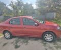Рено Логан 2013 в Киеве на Automoto.ua Красный Рено Логан, объемом двигателя 1.2 л и пробегом 300 тыс. км за 4000 $, фото 2 на Automoto.ua